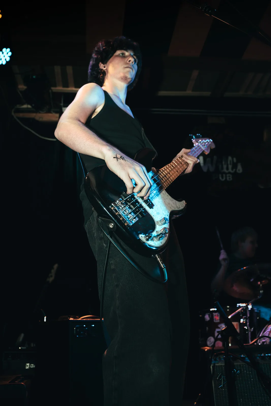 Chase playing bass at Will’s Pub