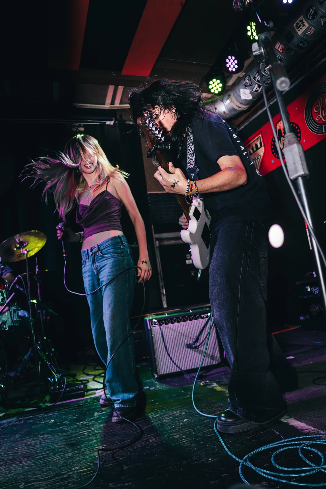 Elena and a guitarist performing side by side